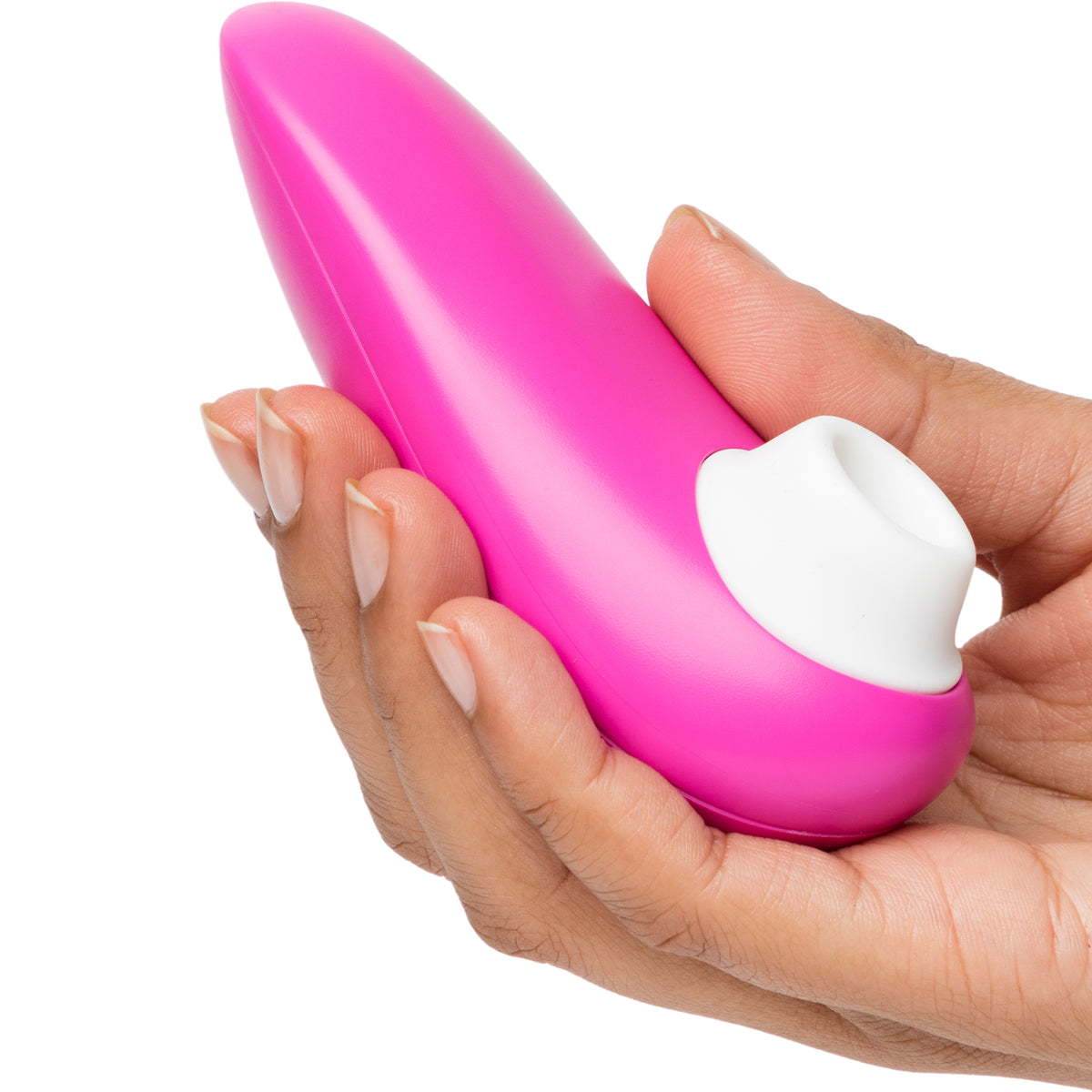 A hand holding a bright pink personal massager with a white control button, shown against a plain white background.