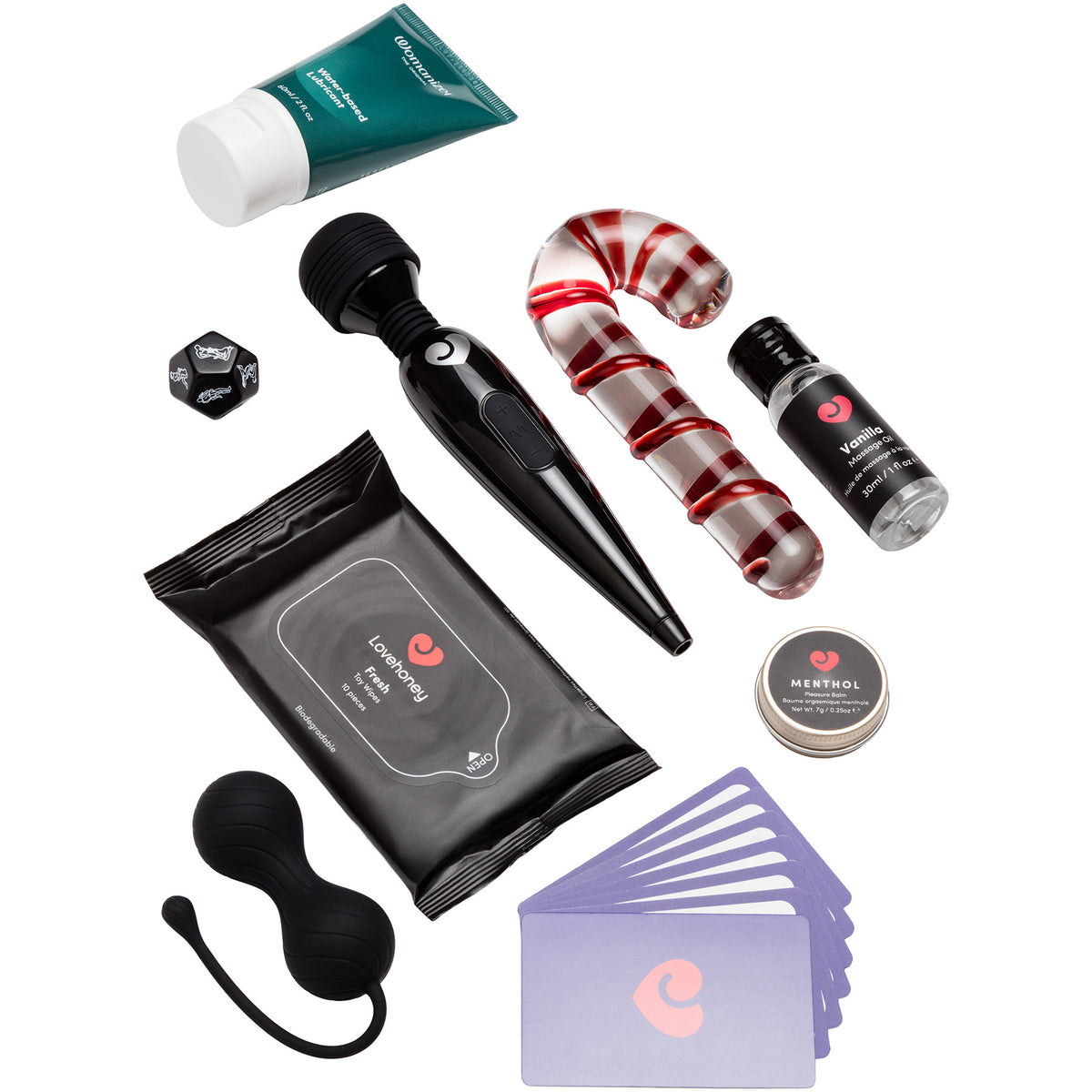 A curated adult wellness gift set laid out on a white background, including a black handheld wand massager, a black silicone Kegel massager, a black pouch of Lovehoney intimate wipes, a purple card deck, a small black dice, a teal personal lubricant tube, a red-and-white striped candy cane dildo, and a small black bottle labeled Menthol Pleasure Balm.