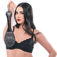 Woman wearing a black bra holding a black paddle against a white background