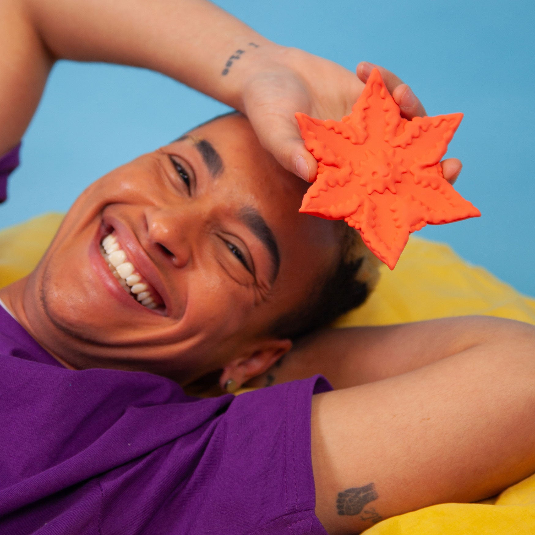 Starsi Silicone Rechargeable Waterproof Vibrator By Cute Little Fuckers - Coral In hand