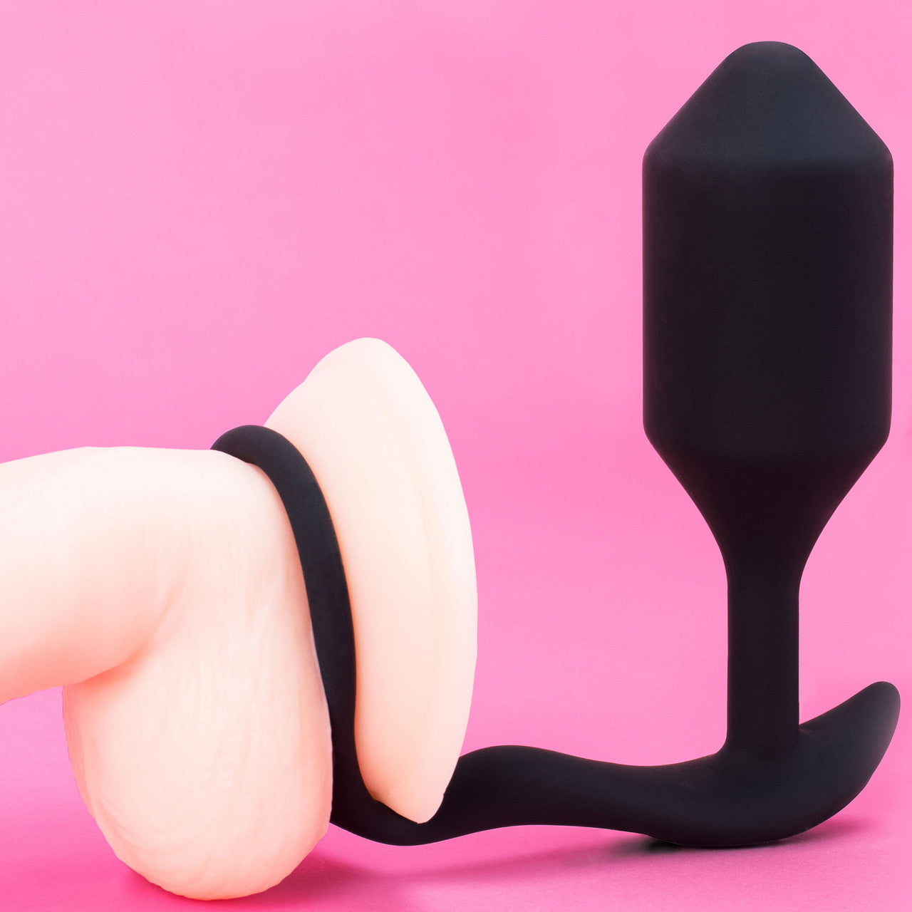 b-Vibe Vibrating Snug & Tug Weighted Silicone Plug & Penis-Ring - X-Large