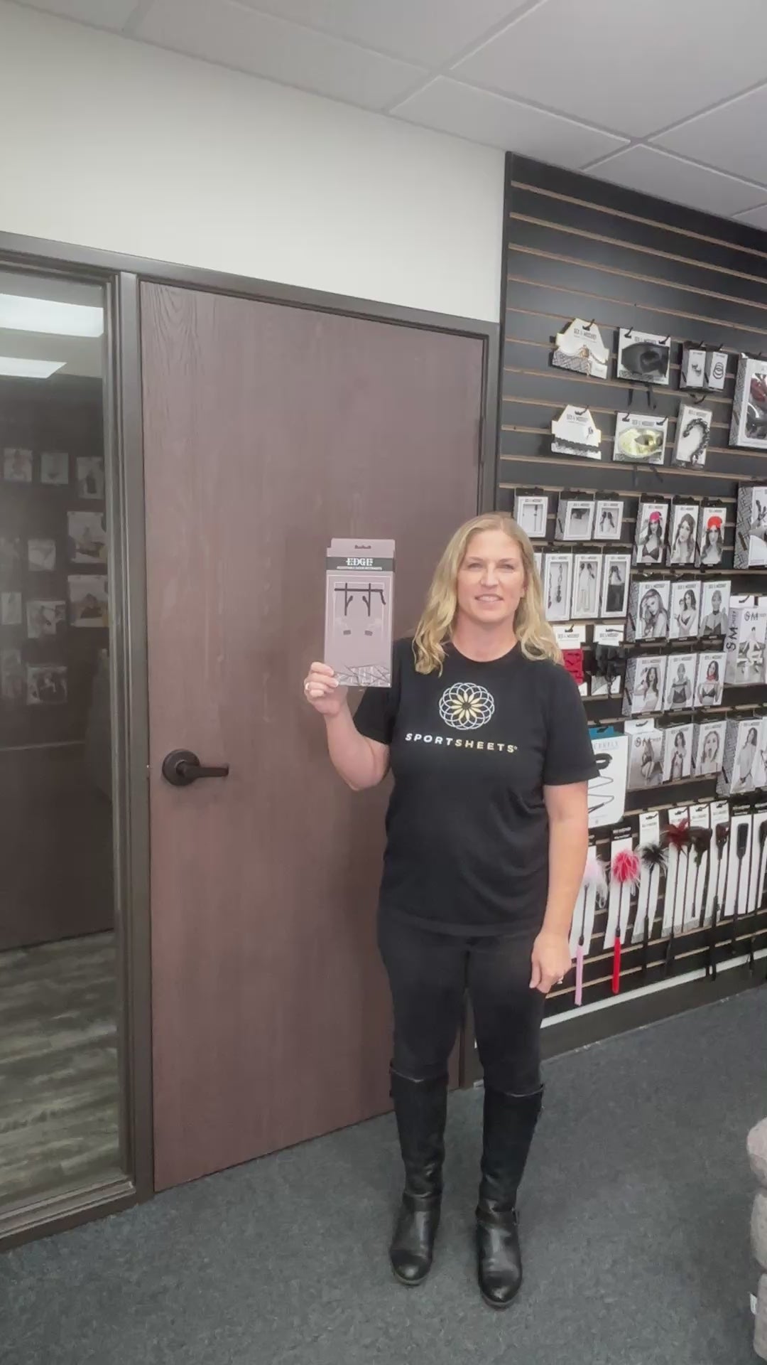 Load video: Control meets convenience. Turn any door into a secure point of restraint. The Edge® Adjustable Door Restraints feature a reinforced, adjustable strap that cinches around the door and two adjustable, slidable straps that drape over the top, each fitted with a heavy-duty gate clip ready to connect to your favorite cuffs. Compatible with most door types, from interior to barn and beyond, this setup delivers strength, versatility, and control anywhere you want it. Cuffs not included.