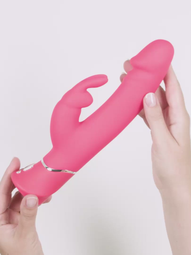 Load video: If you love a lifelike feel, this is the Happy Rabbit® for you. Wrapped in unbelievably soft liquid silicone, its thick, realistic shaft offers you 12 vibration functions, while the iconic rabbit ears caress the clitoris with 3 vibration speeds.  Use the simple 2-button interface to cycle through the speeds and patterns. There are 15 different functions to choose from, so you can find intense blended pleasure and satisfaction. It’s completely waterproof, has a travel lock for peace of mind on the go, and recharges via USB for eco-friendly enjoyment wherever you travel.  Happy Rabbit® loves water-based lube. Happy rabbit® Dual-Density's vital stats: ears have 3 speeds while the shaft has 3 speeds and 9 patterns.